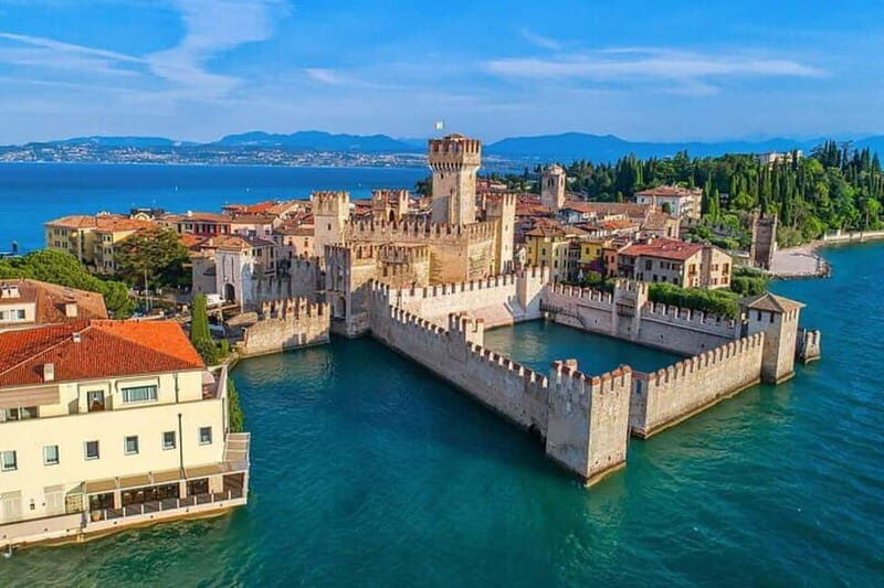 From Verona: Sirmione, Lake Garda with Boat & Spritz Tasting - Piazza Brà meet-up and the smooth ride toward Lake Garda