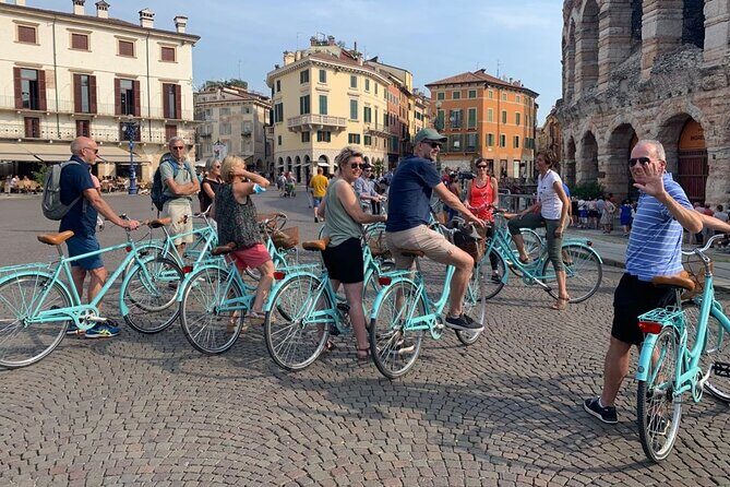 Highlights and hidden gems Verona Bike Tour - Stop 2: Porta Borsari and Piazza delle Erbe (market-square energy)