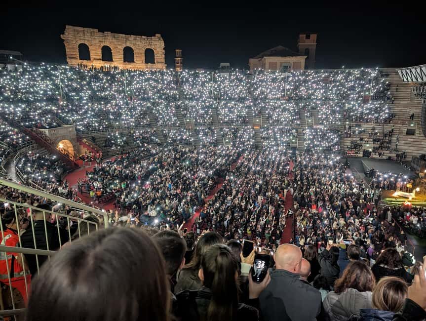 Verona: Arena di Verona Opera Ticket - Inside the Arena di Verona: stone steps, subtitles, and sound