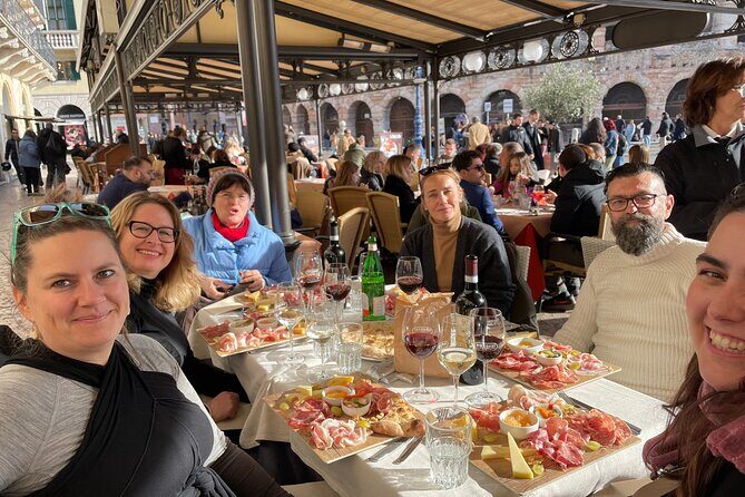 Verona: City Walking Tour with Cable Car Ride & Wine Aperitif - Outside the Arena di Verona: 1st-century stories without the ticket