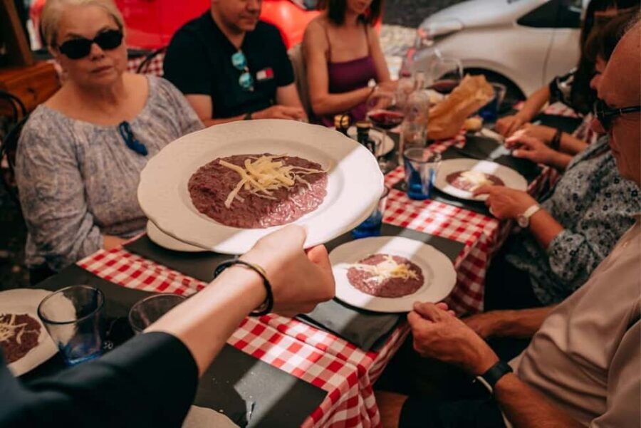 Verona: Food and Wine Tasting Walking Tour - Ponte Pietra wine tasting: drinking with a view, not just a pour