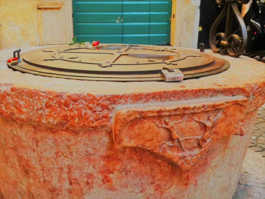 Verona: History and Hidden Gems Guided Walking Tour - Roman Porta Borsari and the pull of the old walls